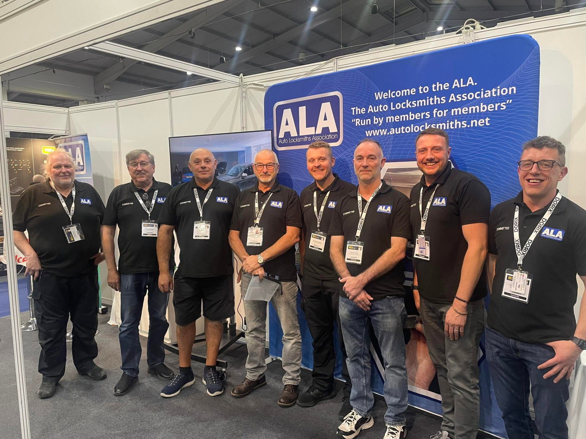 ALA committee members representing the Association at a trade show